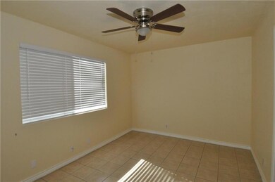 Unfurnished room with light tile patterned floors