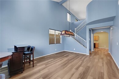 Office area featuring arched walkways, beam ceilin