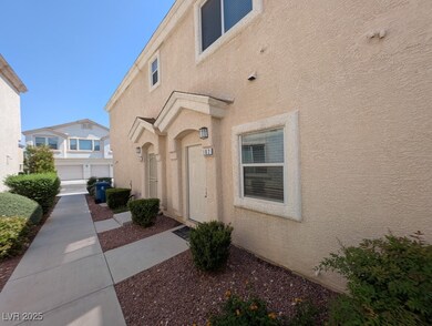 Property entrance featuring stucco siding