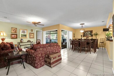 AMPLE LIVING ROOM AND DINING AREA