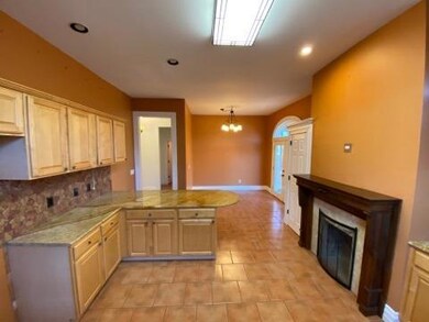 Fireplace in the kitchen makes a warm and inviting