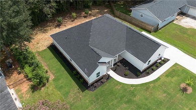 Aerial view of property and surrounding area