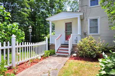 White picket fence and welcoming front porch