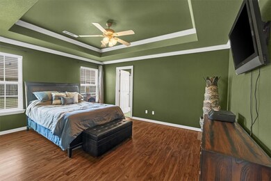 Main Bedroom, door to the main bathroom