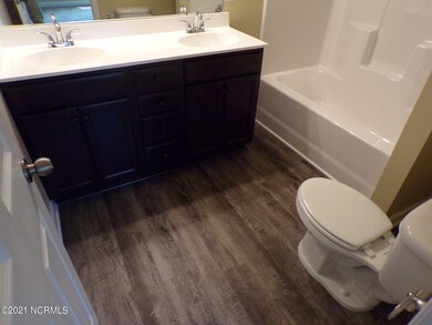 100_1035 Bathroom for bedroom facing bac