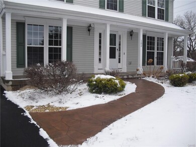 Stamp crete sidewalk & covered front porch