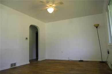 Living/ dining room with  hard wood floor