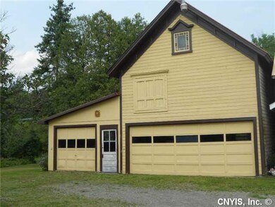 Parking Lot/Garage 3 car garage with TONS of stora