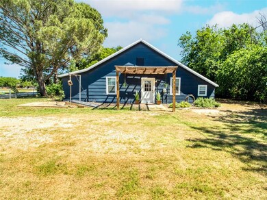 View of front of property featuring a front lawn