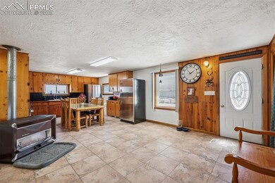 Kitchen featuring plenty of natural light, freesta