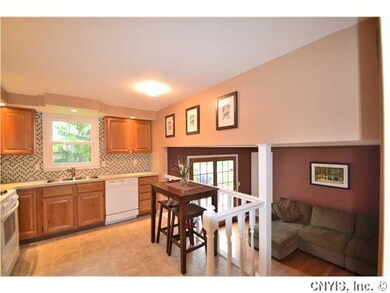 Kitchen. Open-concept overlooking family room.