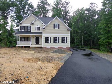 Exterior Front - Siding and roof are on....front p