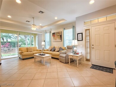 Living area with recessed lighting.