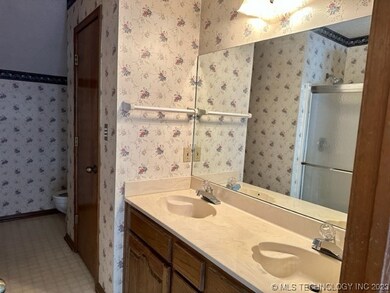 Primary bath with double sinks and large shower