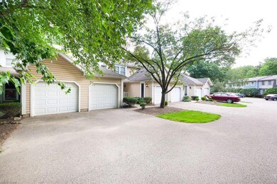 View of front facade featuring garage