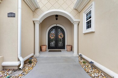 Entrance to property with french doors and stucco siding