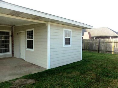 Exterior Front. Work Shop off Of Patio