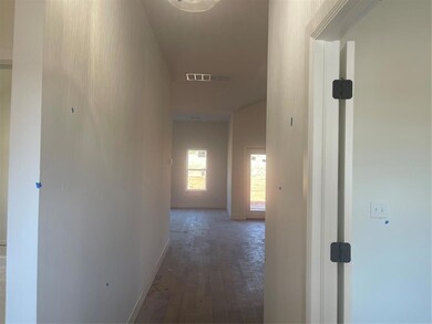 Hall featuring dark hardwood / wood-style floors