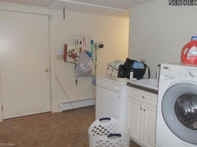 1st floor large laundry room with full wall of cab