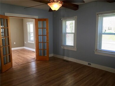 Large Family room with french doors looking into f