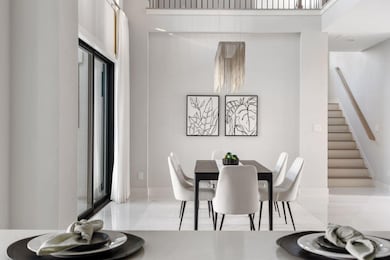 Dining room featuring baseboards, marble finish f