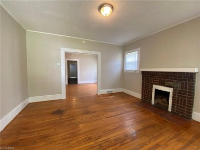 Den with fireplace - current owner has not used fireplace.