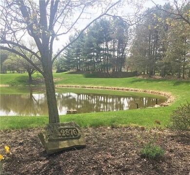 Set adjacent to a peaceful pond, that stately exte