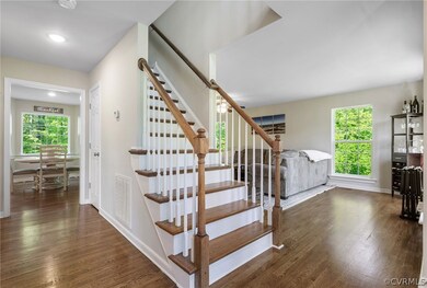 Stairs featuring dark hardwood / wood-style floori