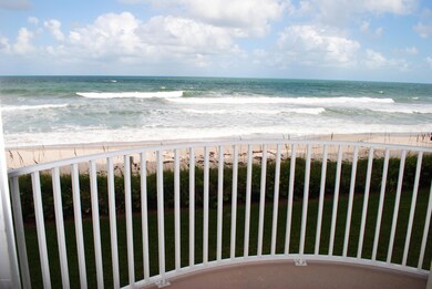 Balcony hangs out over ocean