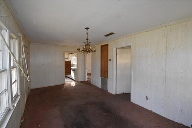 Unfurnished room featuring a wealth of natural lig