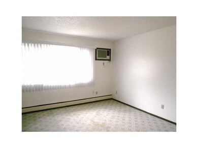 Living Room. Pictures of recent vacant unit repres