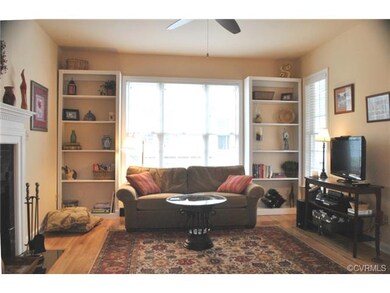 Living room with Hardwood floor, Ceiling Fan optio