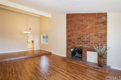 Spacious living room with crackling fireplace for 