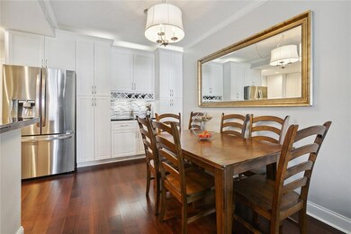 Dining area of unit 435. Full size refrigerator an