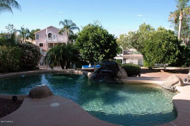 Backyard pool and lake view day