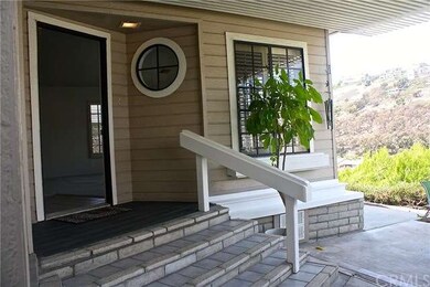 Lovely front entry with patio