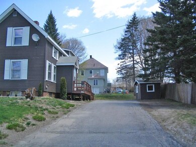 A wide paved yard – and room for a...