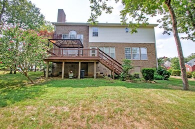 Almost all brick with a small bit of siding.  Nice deck to enjoy relaxing.