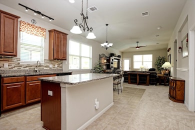 Kitchen with plenty of natural light, open floor 