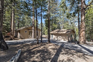 Paved Driveway to Garage and Cabins