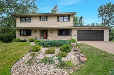 View of front property featuring a garage and a fr