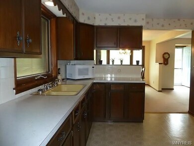 Open view from kitchen to dining room and living r
