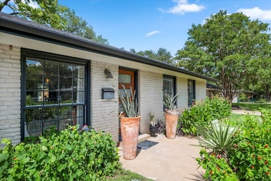 Property entrance with brick siding