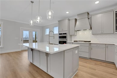 Photos are of a similar home.
