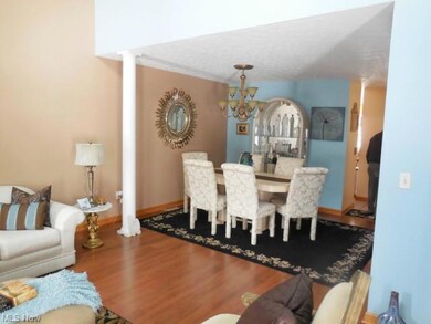 Formal Dining Room with laminate wood floor