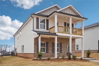 Craftsman inspired home featuring board and batten