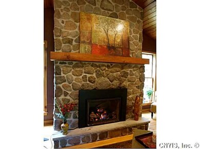 Living Room Fieldstone gas powered fireplace