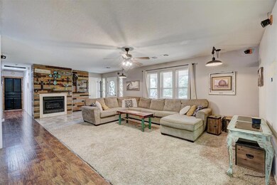 Living room featuring light hardwood / wood-style 