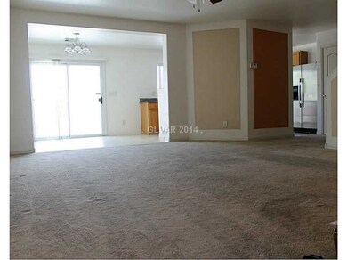 Property Photo. Living room open to the dining are