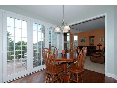 Kitchen. Sun-drenched dining area with access to t